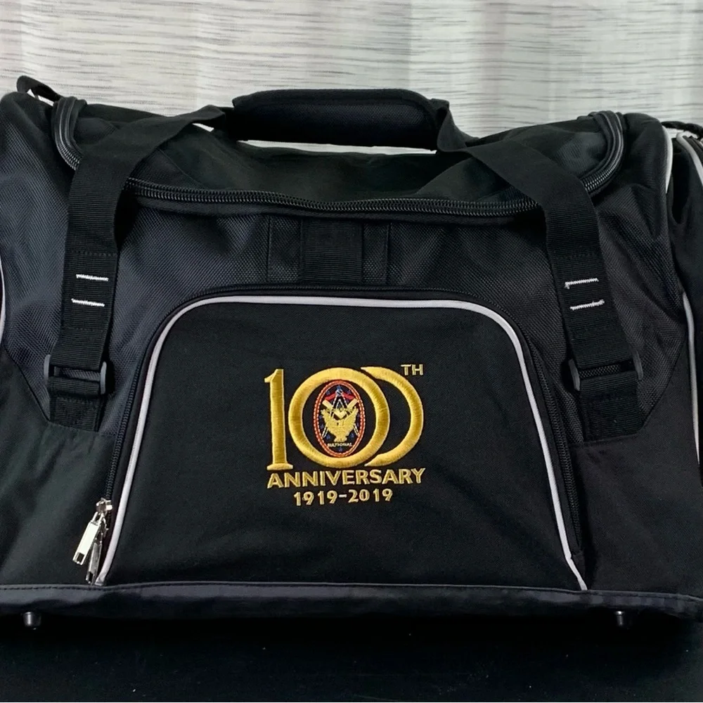 A Black 100th Anniversary Duffel Bag (Masonic?).